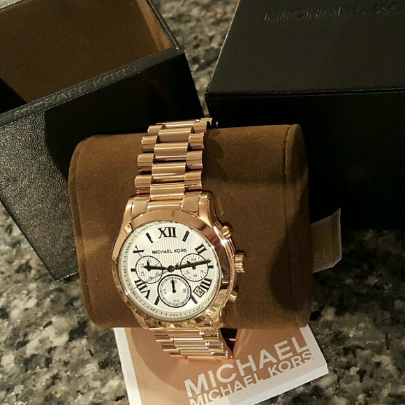 Michael Kors Cooper Chronograph White Dial Ladies Watch MK5929 Water resistance: 100 meters / 330 feet Movement: Quartz  