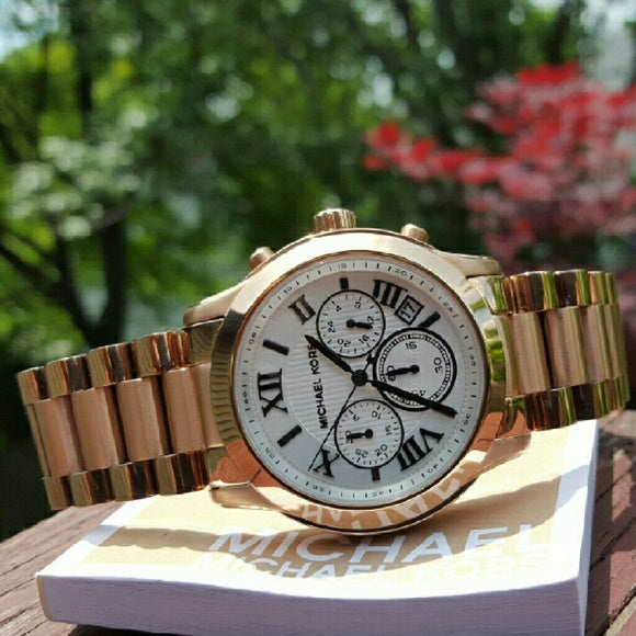 Michael Kors Cooper Chronograph White Dial Ladies Watch MK5929 Water resistance: 100 meters / 330 feet Movement: Quartz  