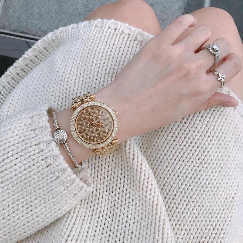 Michael Kors Watches Gold Crystal Dial Gold-tone Ladies Watch MK3398 Water resistance: 50 meters / 165 feet Movement: Quartz  