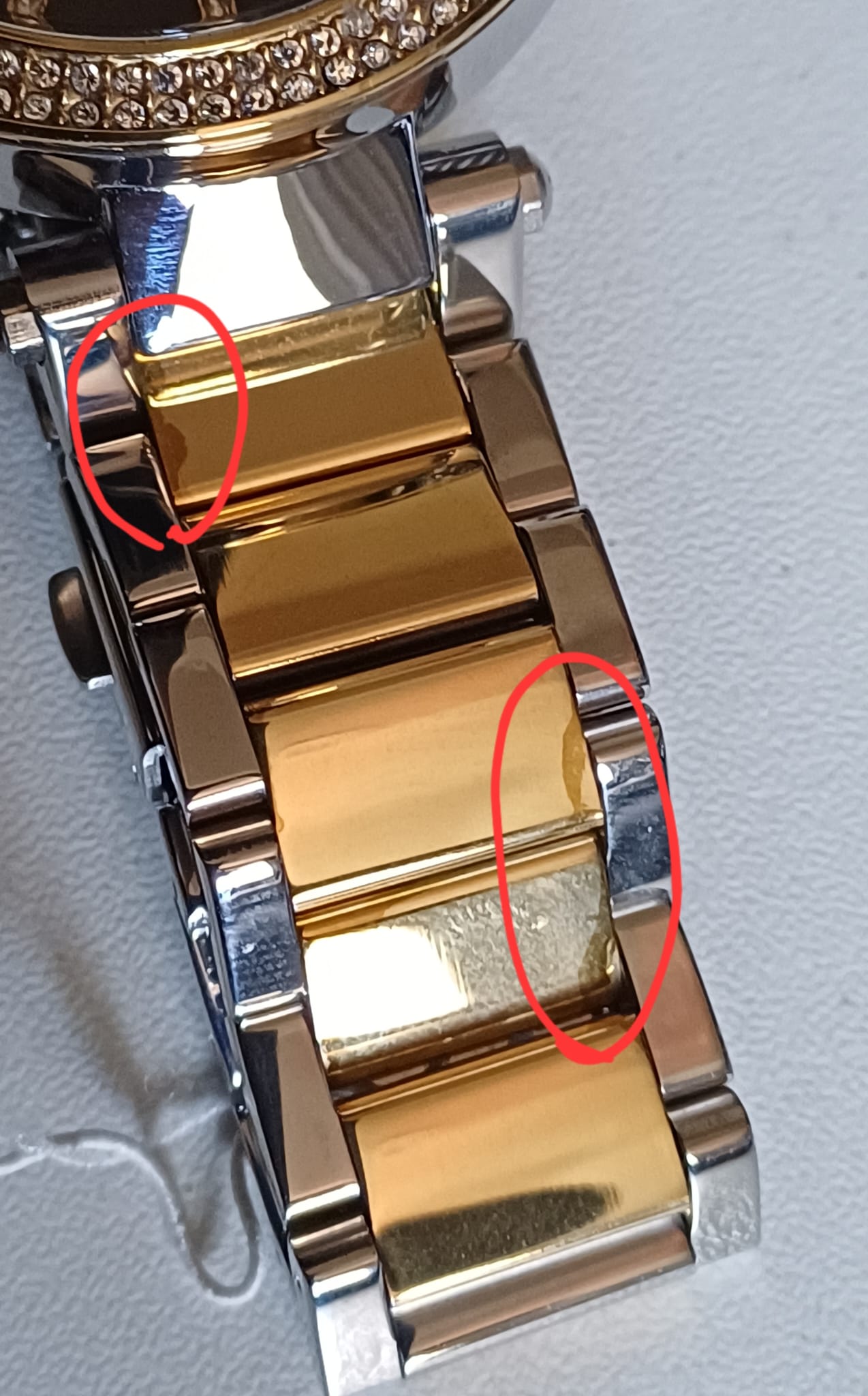 Michael Kors Parker two-tone gold and silver stainless steel bracelet strap close-up