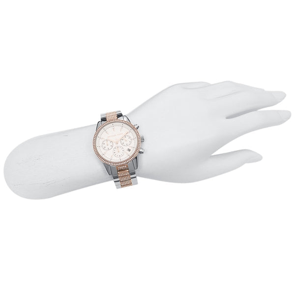 Michael Kors Ritz watch worn on wrist showing chronograph dial and two-tone bracelet