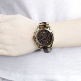 Michael Kors Bradshaw Chronograph Chocolate Dial Ladies Watch MK5696 Water resistance: 50 meters / 165 feet Movement: Quartz  