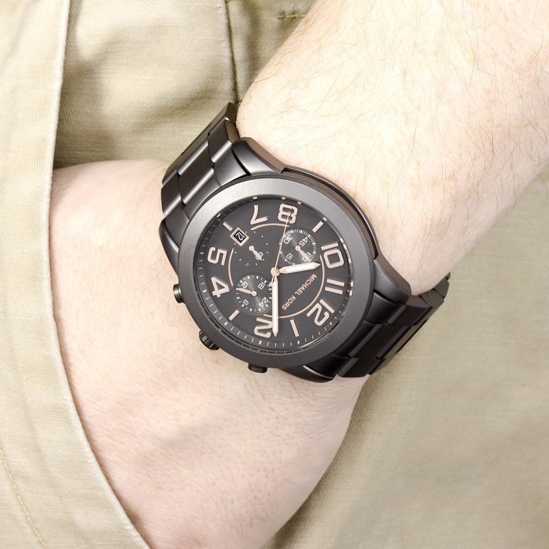 Michael Kors Mercer Chronograph Black Dial Men's Watch MK8330 Water resistance: 100 meters / 330 feet Movement: Quartz  
