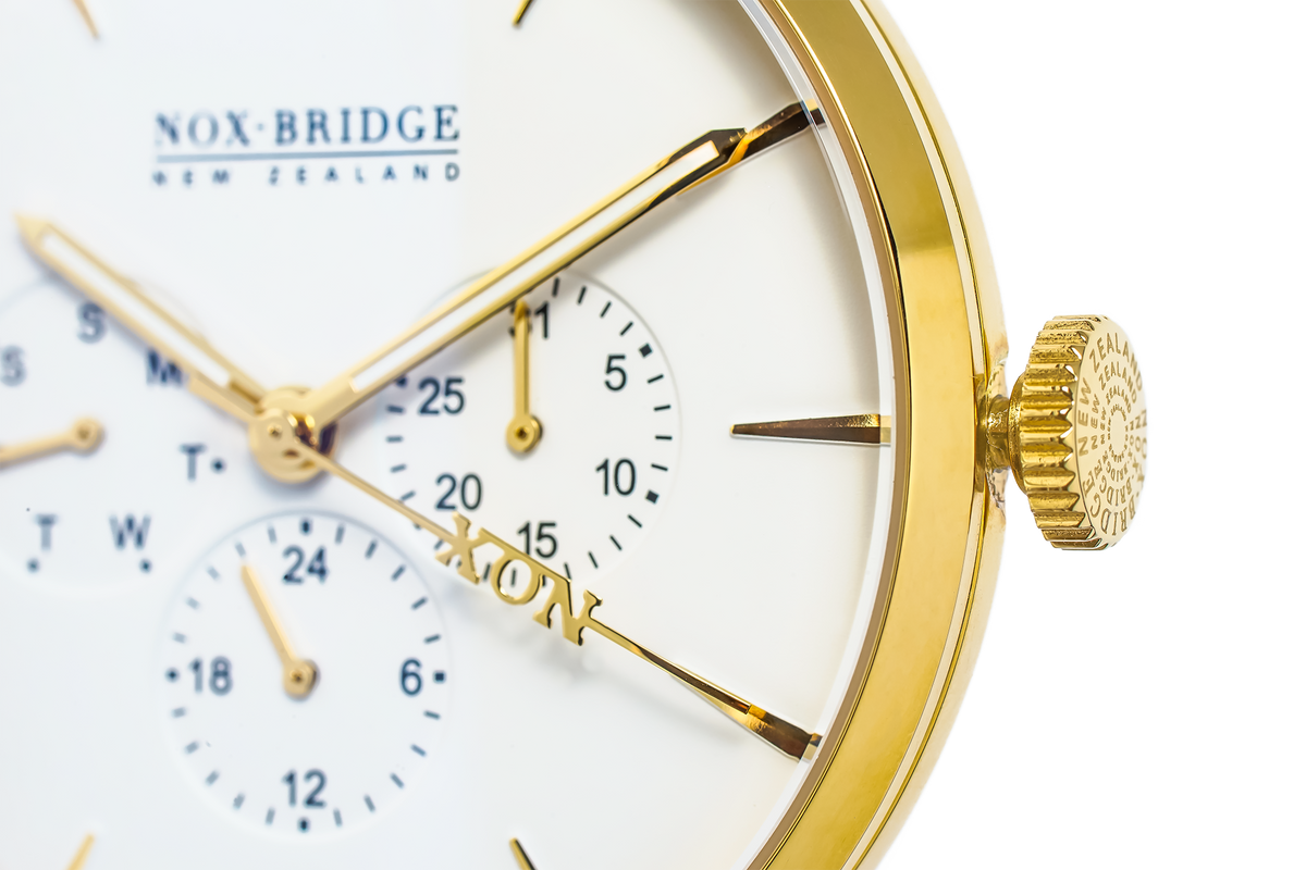 Close-up detail of Noxbridge Capella dial showing chronograph subdials and gold hands