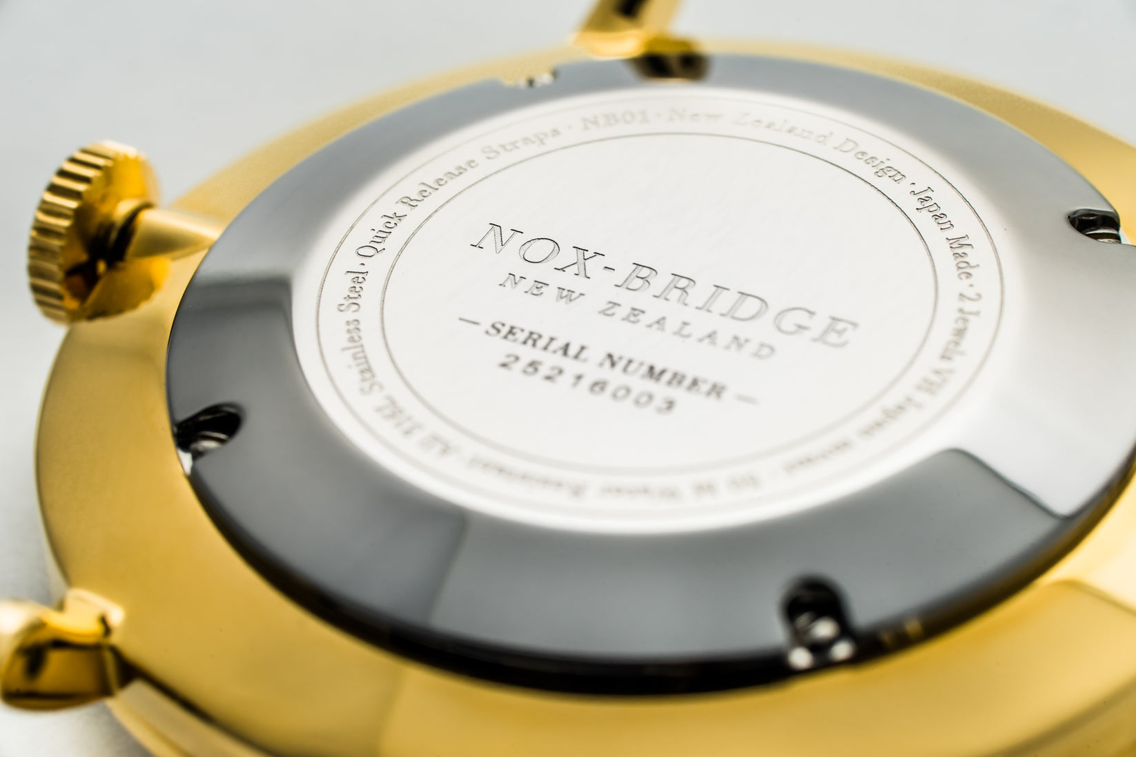 Noxbridge AG41 caseback engraved with serial number and New Zealand branding