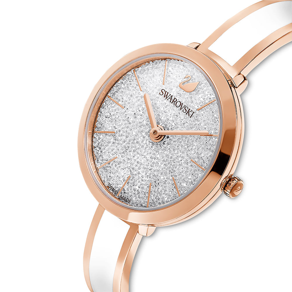 Angled view of Crystalline Delight silver dial watch with rose gold tone case
