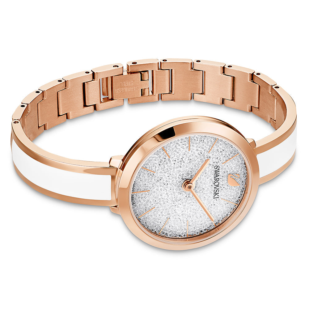 Crystalline Delight watch on wrist showing rose gold case and white strap