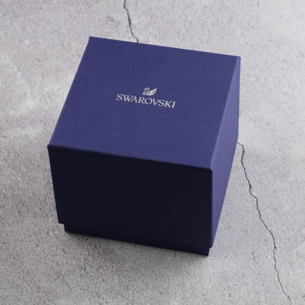 Swarovski Octea Lux watch packaging with navy blue Swarovski branded box
