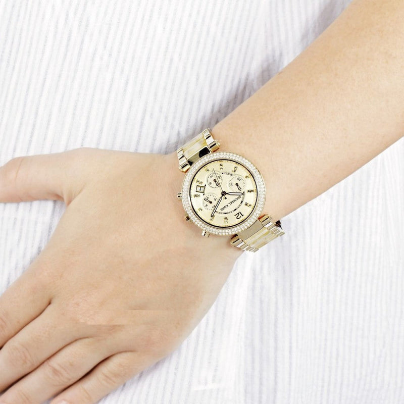 Michael Kors Parker Chronograph Champagne Dial Ladies Watch MK5632 Water resistance: 30 meters / 100 feet Movement: Quartz  